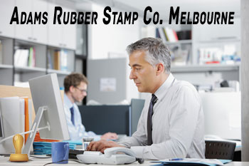 man using personalised business stamps